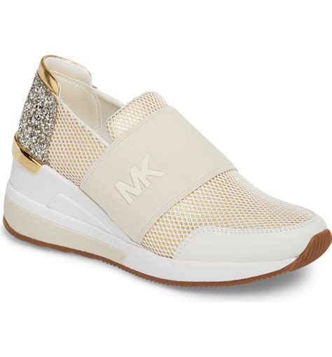 tenis feminino michael kors|Michael Kors slip on sneaker.